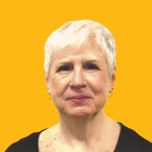 Photo of Sherri Taylor in a black shirt with a yellow background